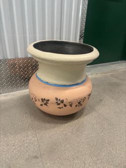 Large decorated ceramic planting pot. With hole in the bottom. 18 “ around by 18” high $40