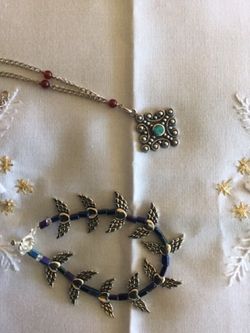 Silver necklace and bracelet together