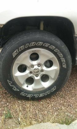 Jeep Rims great condition no scratches or dents .. with tires