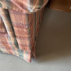 A little bit of cat scratch which the scene in the pictures and that's about it. Another words it's not bad just normal wear and tear nice nice couch.