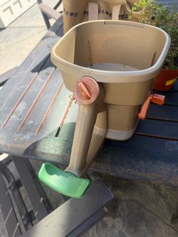 Grass seed spreader