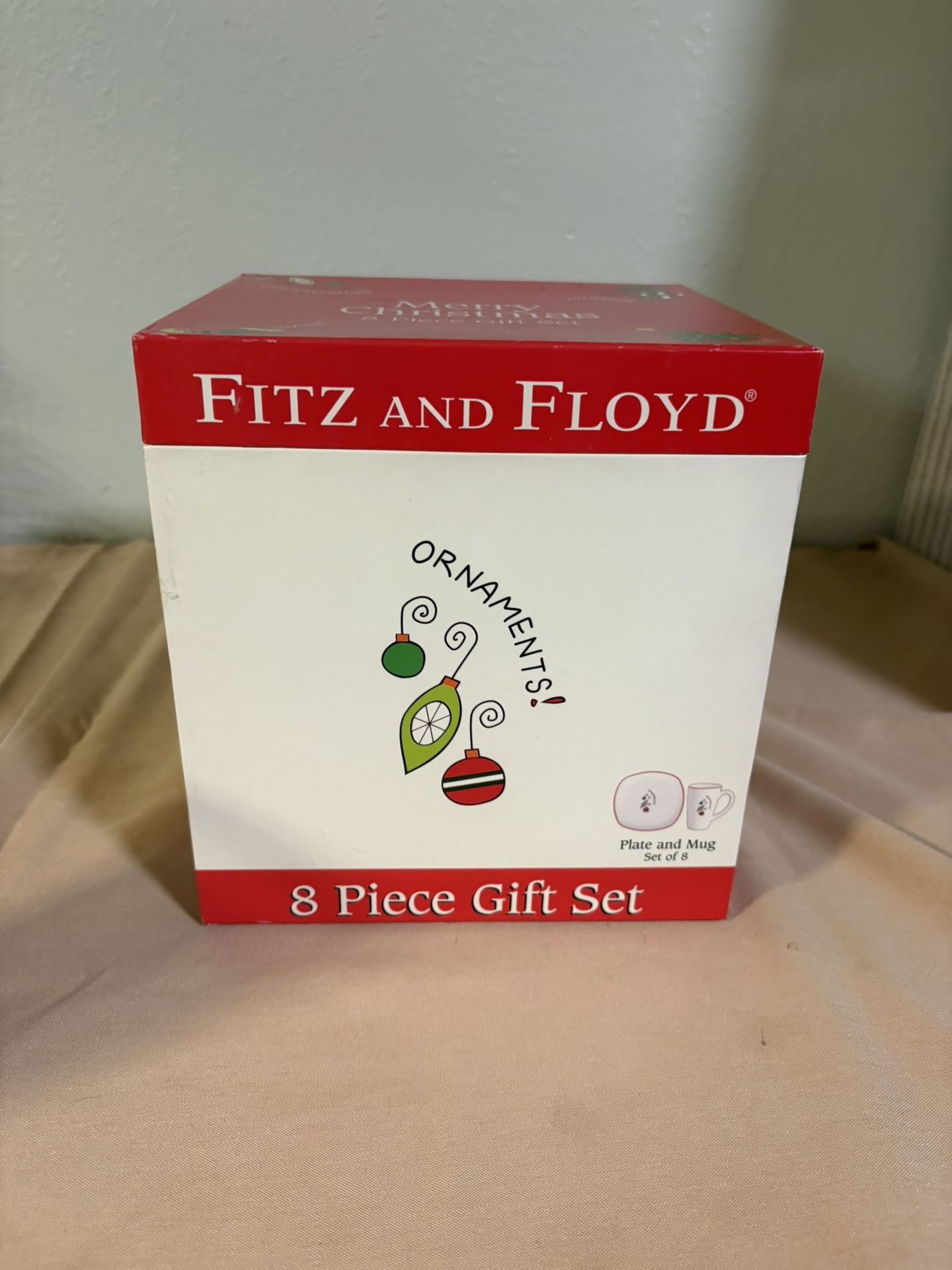 Fitz and Floyd 8-piece gift set, featuring plates and mugs with a holiday ornament design
