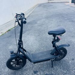 Mildly Used Electric Scooter With Seat &Basket For Sale