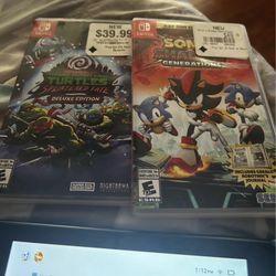 Nintendo Switch And 2 Games 