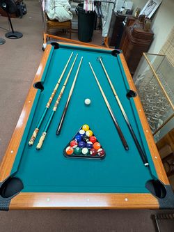 Pool Table with Balls and Cues