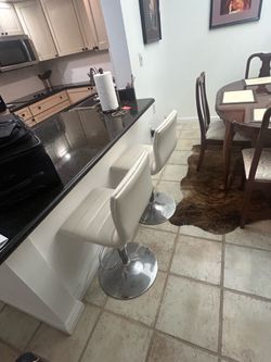 2 swivel adjustable barstools