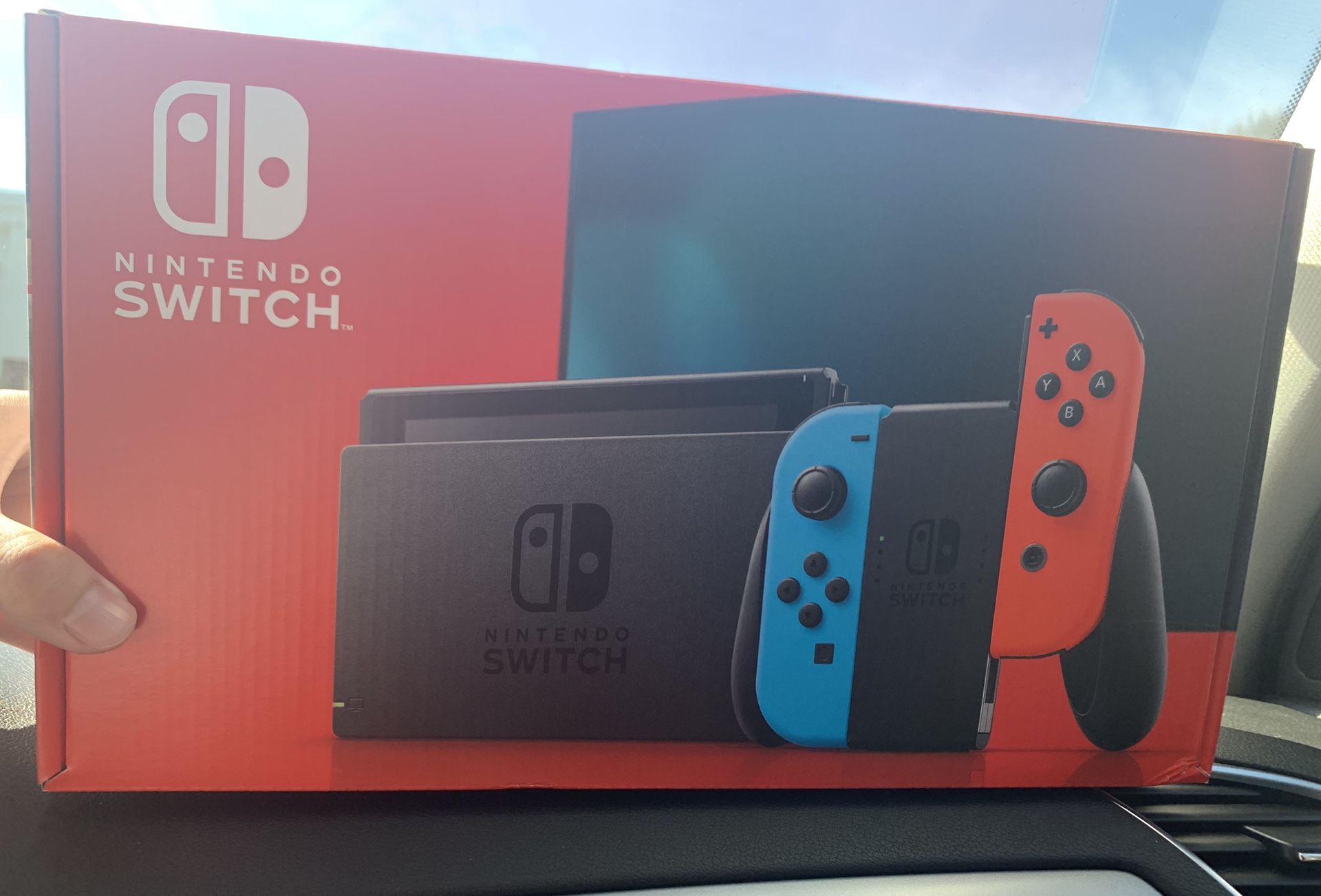 Nintendo Switch with Neon Blue and Neon Red Joy‑Con V2