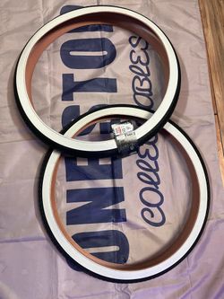Seat of 2. 26” White Wall Tires Brick Tread