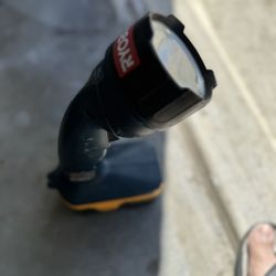 Flashlight With Battery Tool