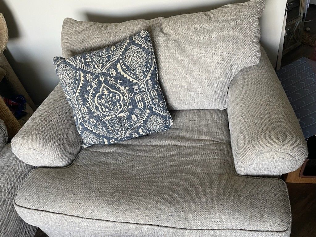 Sofa And Chair With Decorative Pillows