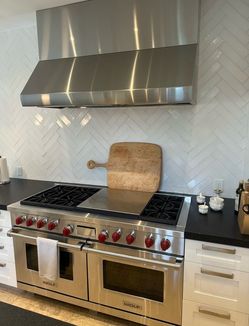 Wolf 60” Gas Range + Stainless Steel Range Hood