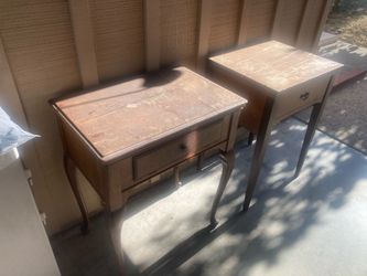 Two sewing cabinets