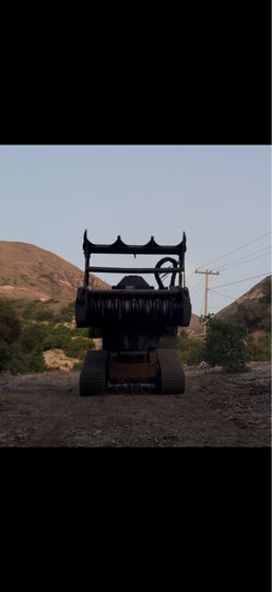 Land clearance skid steer machine