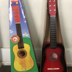 Kids play guitar 