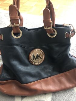 Michael Kors black and tan purse