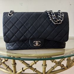 Authentic Chanel Classic Flap Bag – Black Lambskin – Silver Hardware