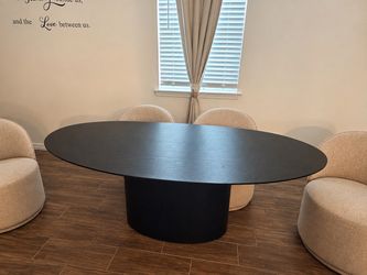 CITY HOME Nomad Black Oval Dining Table + Cream Dining Chairs