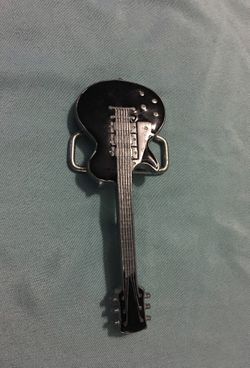 Guitar belt buckle