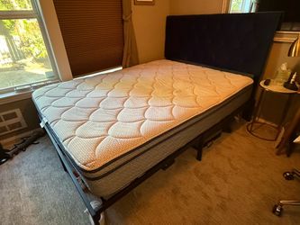 Queen sized bed w/ frame and headboard