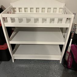 White changing table and everything is included