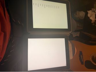 2 iPads. They turn on but are locked obsolete.   For parts only.