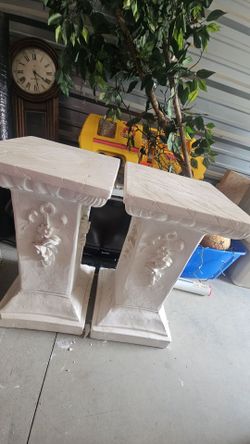 2 matching plant podiums