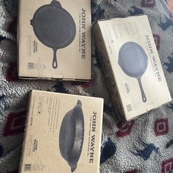Cookware cast-iron John Wayne brand new inbox never been open three piece $49 total very good deal