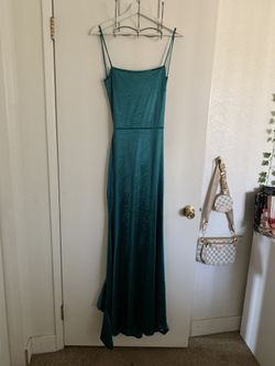 Emerald green open back prom dress