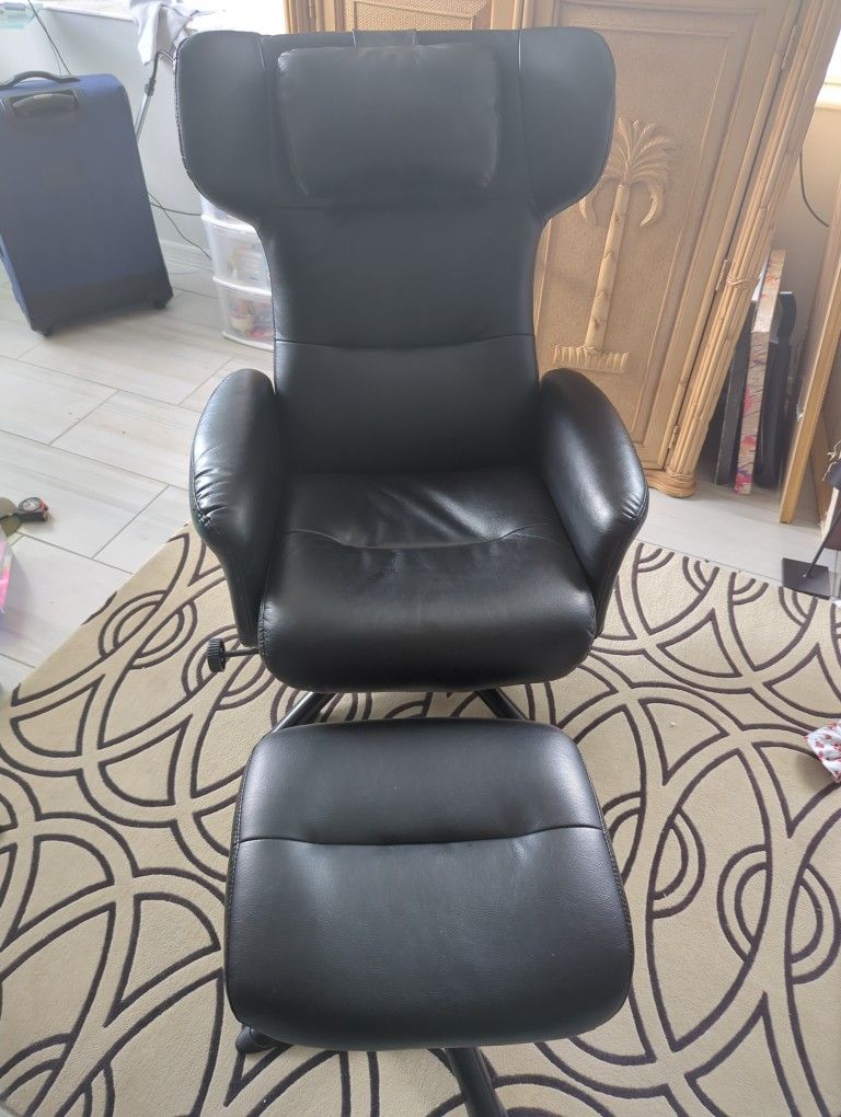 Comfortable reclining chair with footrest
