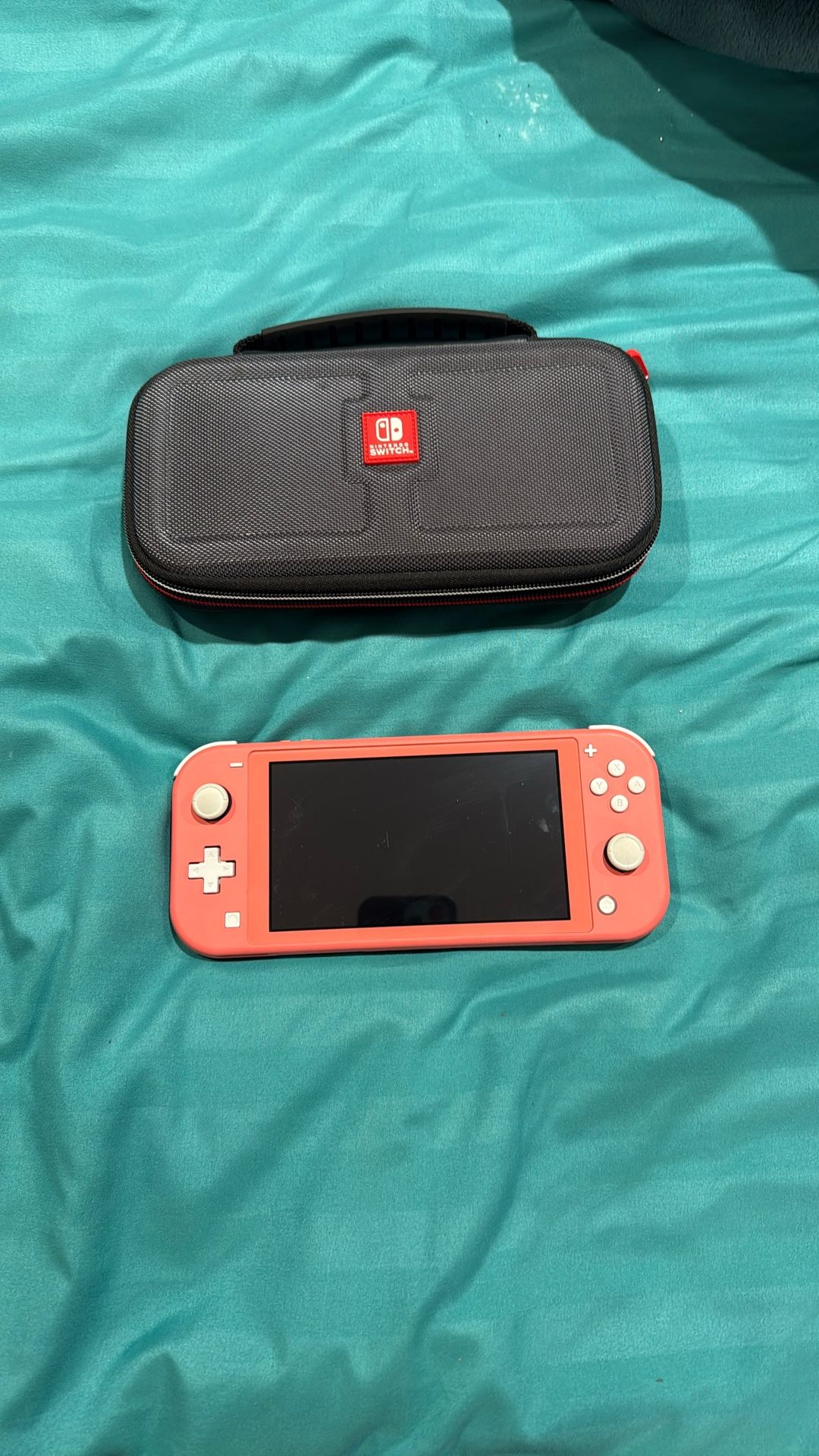 Nintendo Switch LITE With Case!  (CORAL)