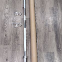 OLYMPIC  BARBELL BAR  7ft.
 45lb. AND OLYMPIC BUMPER
  WEIGHT  PLATES.