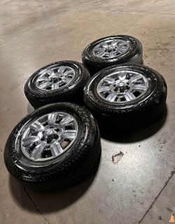 Used 18”  6x135 inch chrome wheels  with  Bridgestone tires 265-70-18 Fitments: FORD F150 expedition Lincoln mark navigator 6 lug