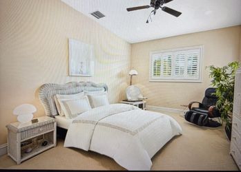 Four Piece Wicker Bedroom Set