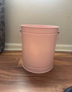 Pink trash can