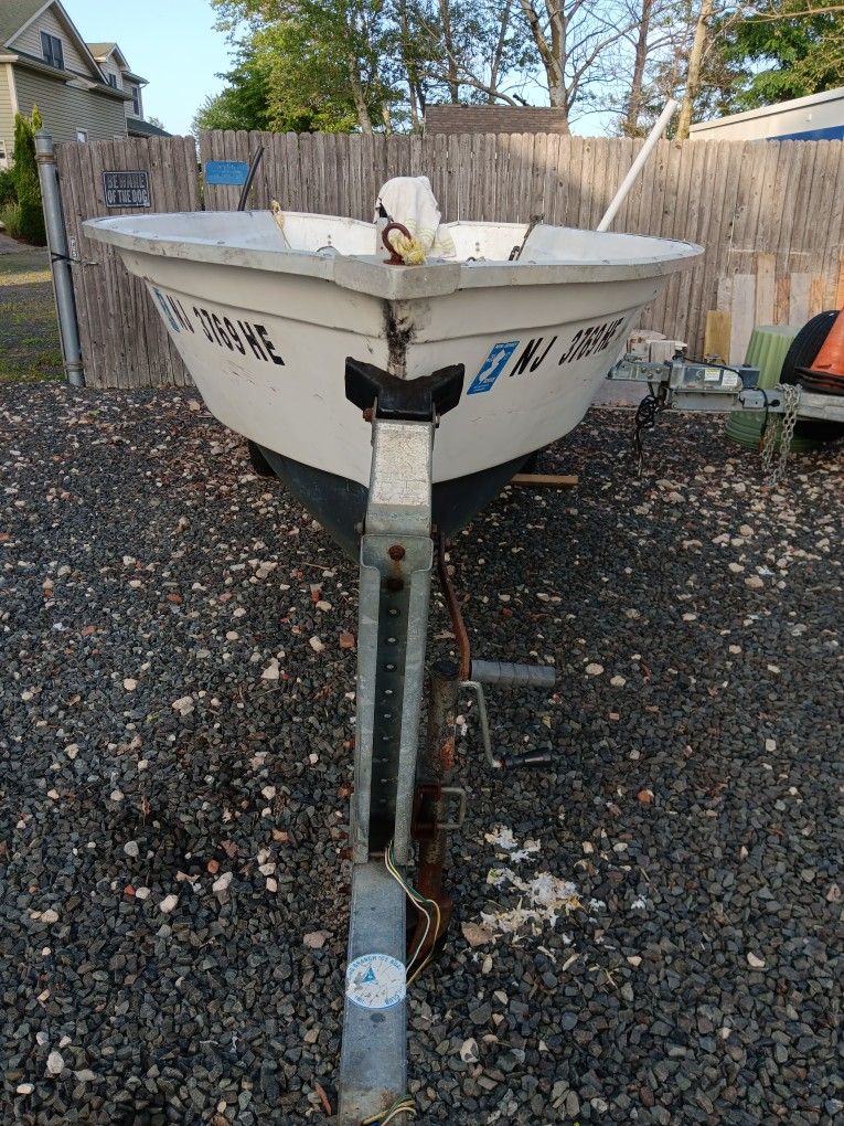 16 Ft. Apache Fiber Boat V Hull 15 H P Motor.