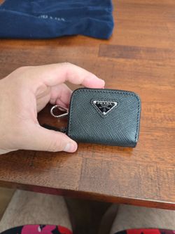 Prada Saffiano zip airpod holder with Silver Prada Logo