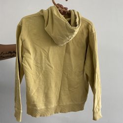 Yellow brandy Melville yellow sweater.  Missing the string on the hood. Bin A