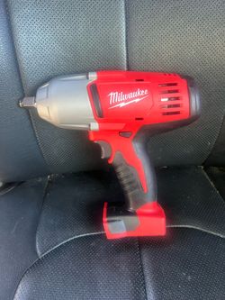 Milwaukee 2663-20 M18 18V Lithium-lon Cordless 1/2 in. Impact Wrench W/ Friction Ring (Tool-Only) • Peak torque of 450 ft. Ibs.