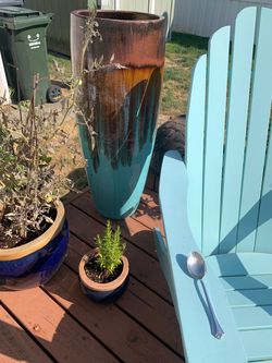 Terra Casa extra large outdoor pottery with matching Adirondack chairs and Free fish pizza oven from world market