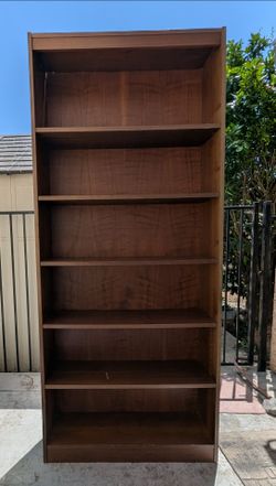 Tall wooden bookcase