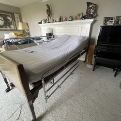 Invacare Full-Electric Low Homecare Bed Frame (5410LOW), mattress and full guard rails.