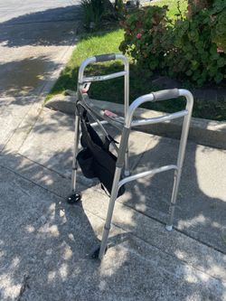 Folding walker for elderly