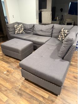 Sectional couch with ottoman and storage