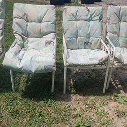 Four Chairs With Cushions