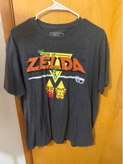 This is a Nintendo Legend of Zelda Original Title Graphic Tee in heather charcoal gray XL on tag  Smoke free home  Very good condition