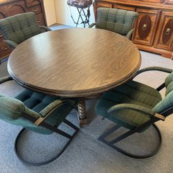 Round wooden pedestal Kitchen table and 4 upholstered Green chairs