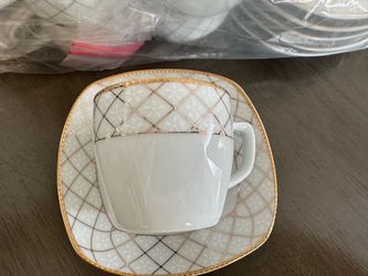 White Porcelain Cup and Saucer Set