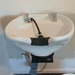 Wall mount shampoo bowl