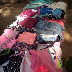 Table Full Of Girls Clothing