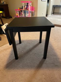 Sturdy space, saving black table